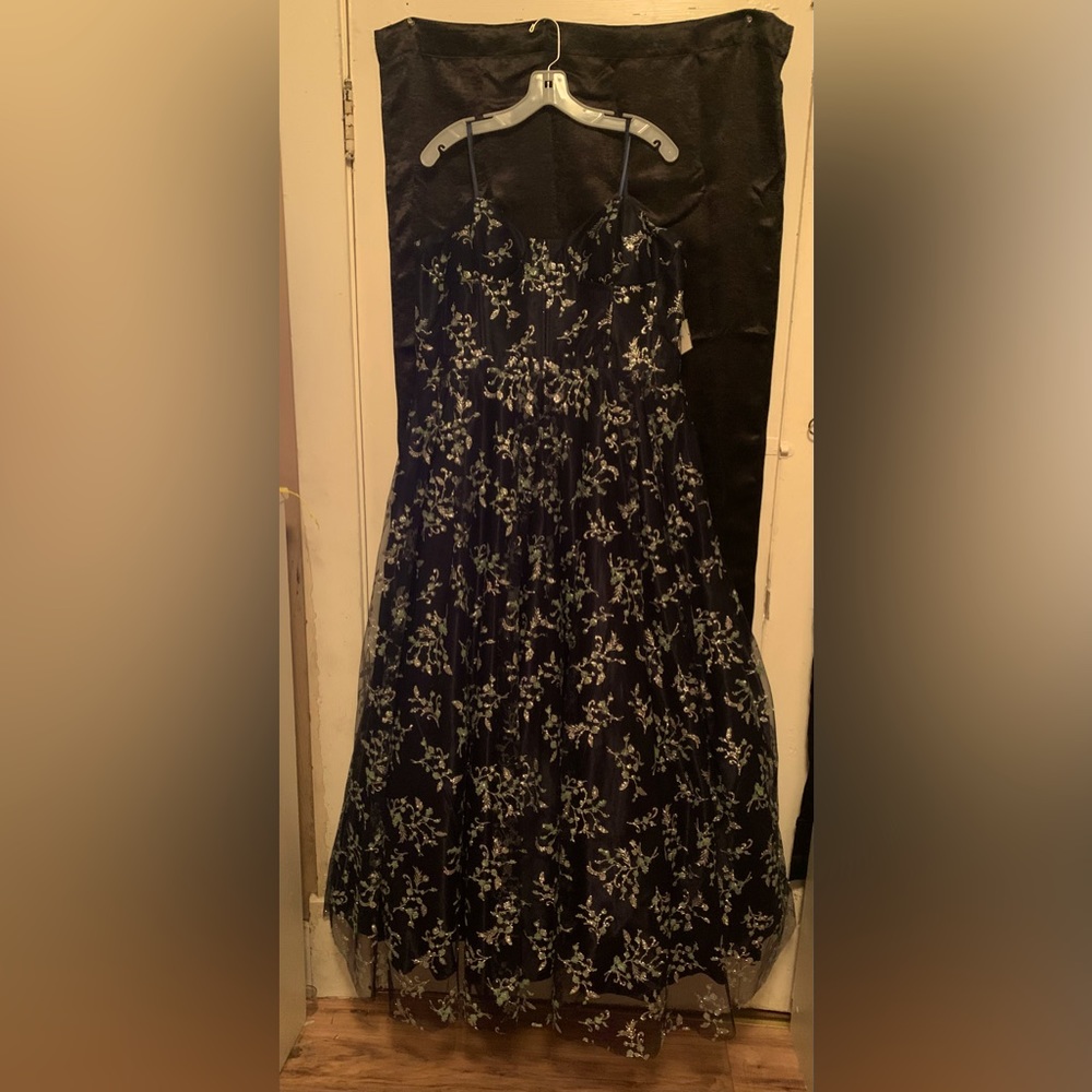 But this is a prom dress last year never worn, and still has tags on